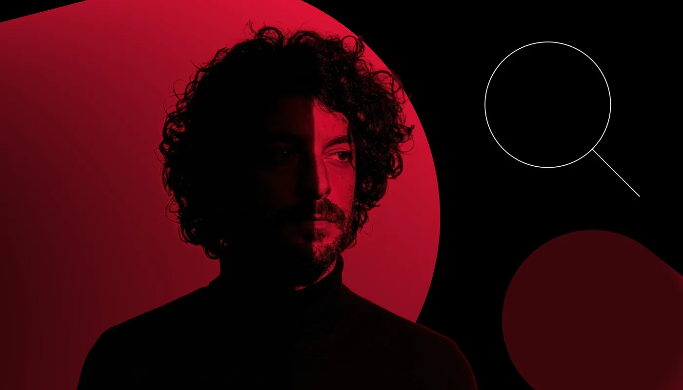 Half-lit man's face, magnifying glass icon on the right side of the image.